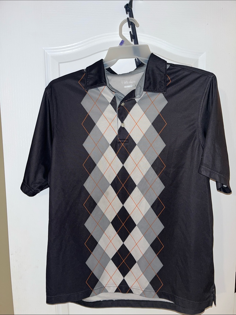 Walter Hagen Black Polo with Gray Argyle and Orange Accents